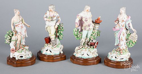 Set of four Chelsea porcelain figures