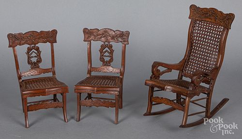 Set of three carved oak doll chairs, ca. 1900