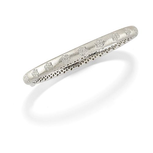 A 18K satin white gold and diamond bracelet