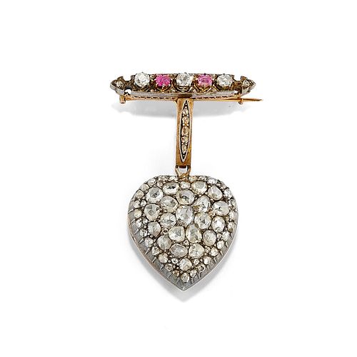 A silver, low-carat gold, ruby and diamond pendant
