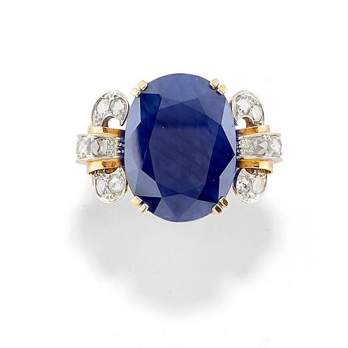 A 12K two-color gold, sapphire and diamond ring