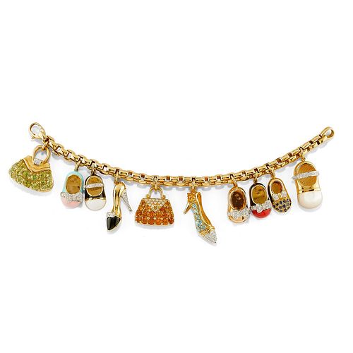 A 18K yellow gold, diamond, colored gemstone, enamel and mother-of-pearl charms bracelet