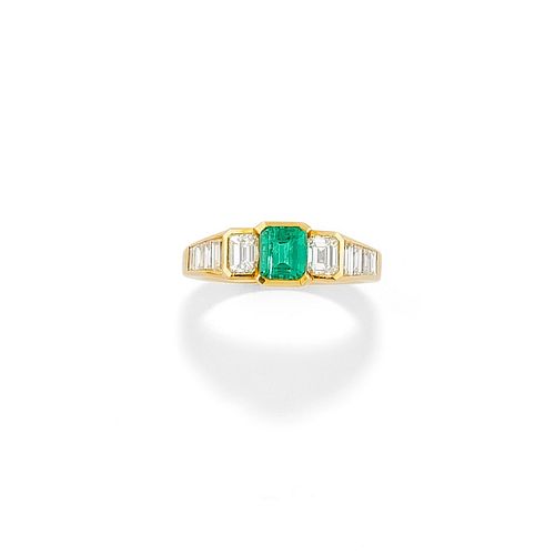 A 18K yellow gold, emerald and diamond ring