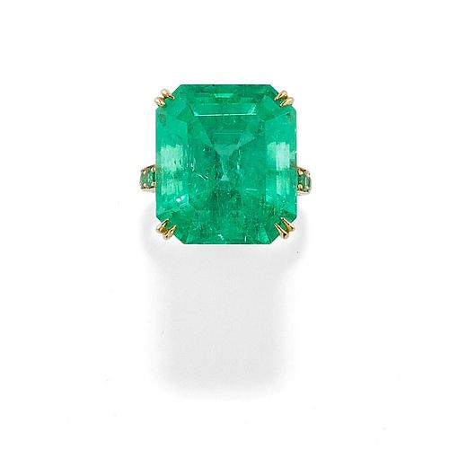 A 18K yellow gold, emerald and diamond ring, with certificate