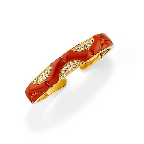 Chaumet - A 18K yellow gold, coral and diamond bangle, Chaumet