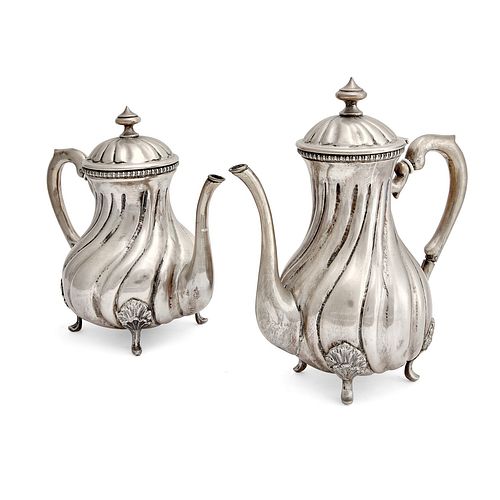 A silver tea and coffee pot