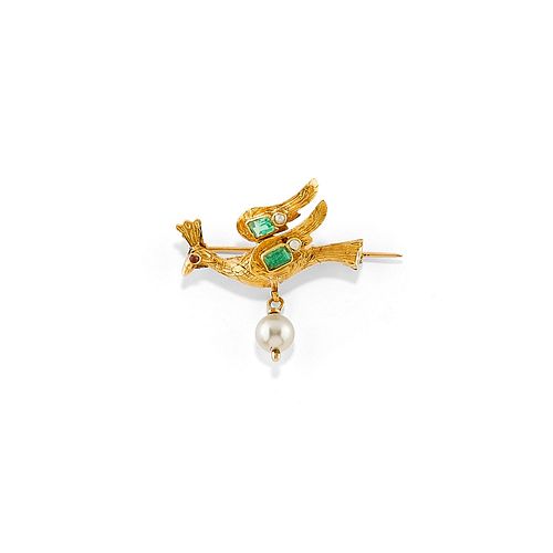 A 18K yellow gold, emerald, uncolored gemstone and ruby brooch