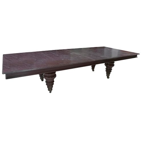 Banquet table. 20th century. Carved in wood. With rectangular cover, extension system, ringed shafts.