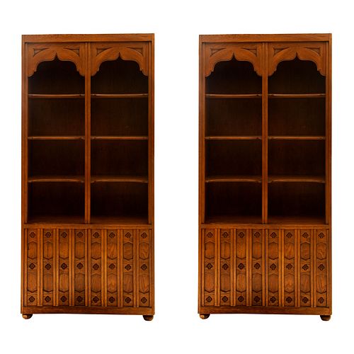 Pair of display cases. 20th century. Carved in wood. With shelves, 2 folding doors and bun-type supports. 77.5 x 36.2 x 14" (197 x 92 x 36 cm)
