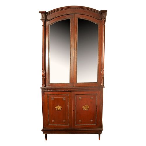 Cabinet. 20th century. Carved in wood. With 4 folding doors, 2 glass doors, internal rectangular moon mirror and smooth supports.