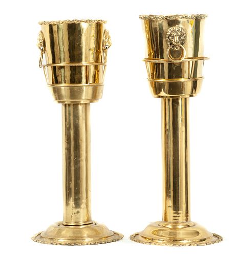 Pair of Ice Buckets. 20th century. Made in brass. With pair of bases and circular handles. Decorated with lion masks.