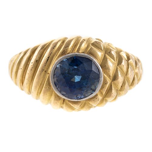 A Solid 18K Gold Ring with a Very Fine Sapphire
