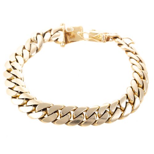 A Gent's Solid 14K Gold Cuban Chain Link Bracelet