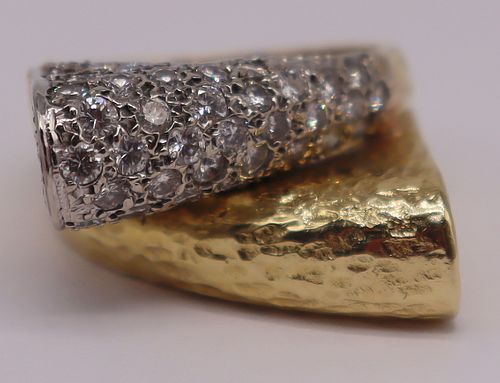 JEWELRY. 18kt Gold and Diamond Bypass Ring.