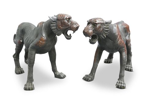 A LARGE PAIR OF BRONZES OF BENGAL TIGERS, each mo