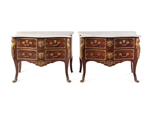 A Pair of Regence Style Gilt Bronze Mounted Marble-Top Commodes