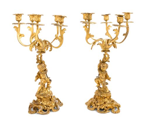 A Pair of Louis XV Style Gilt Bronze Five-Light Figural Candelabra