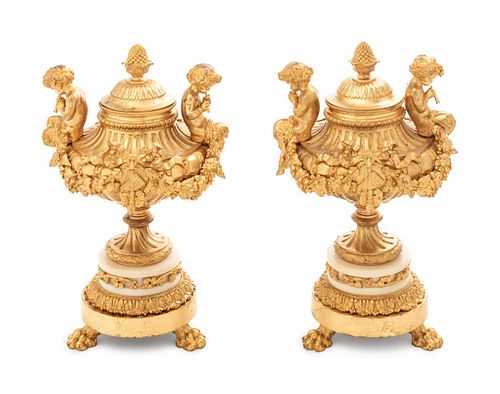 A Pair of Louis XV Style Gilt Bronze and White Marble Covered Urns