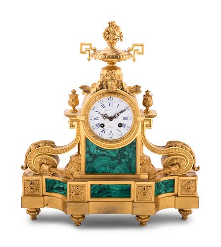A Louis XVI Style Malachite and Gilt Bronze Mantel Clock