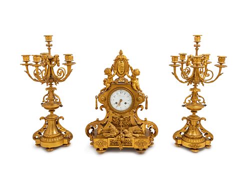 A Louis XVI Style Gilt Bronze Clock Garniture