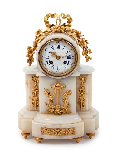 A Louis XVI Style Gilt Bronze Mounted Onyx Mantel Clock 