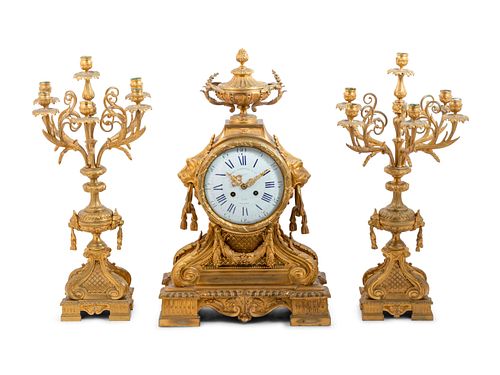 A Napoleon III Gilt Bronze Clock Garniture