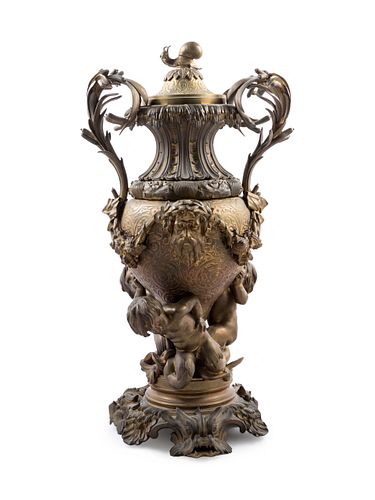 A Napoleon III Style Parcel Gilt Bronze Covered Urn