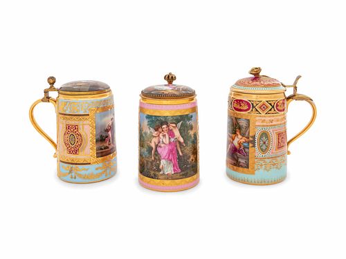 Three Vienna Painted and Parcel Gilt Porcelain Tankards