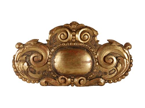 A Continental Carved and Giltwood Ornament