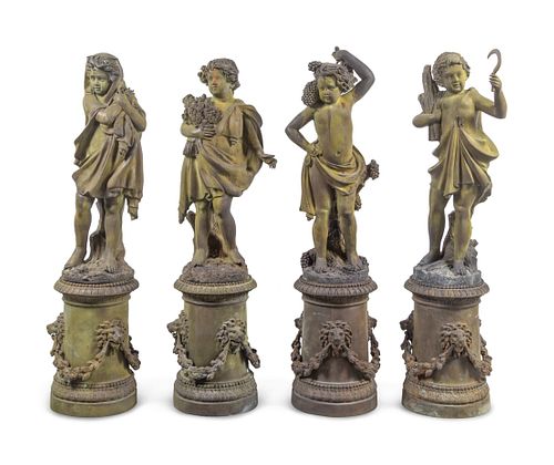 A Set of Four Cast Metal Garden Figures Allegorical of the Seasons