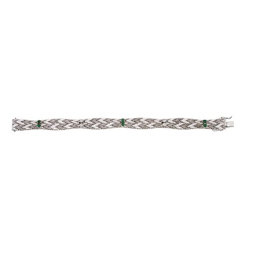 Bracelet with diamonds and emeralds in white 18k gold, with 4 diamonds and 6 emeralds. Weight: 35.8 g. Length: 7.2"
