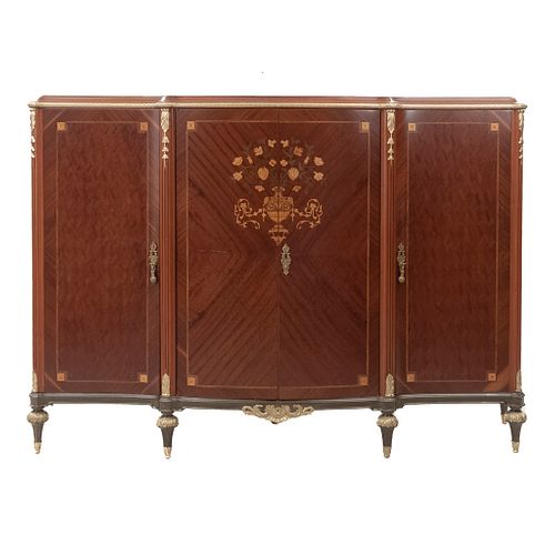 Commode. 20th century. Louis XVI. Made in wood. 4 doors and 3 handles. Marquetry. 59.8 x 86.6 x 22.8" (152 x 220 x 58 cm)