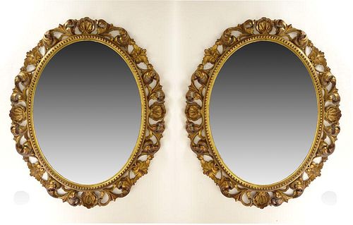 Pair of Early 20th Century Carved and Giltwood Mirrors