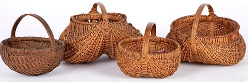 Four small splint oak baskets
