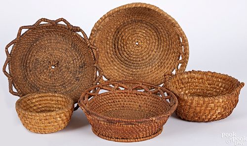 Five rye straw baskets