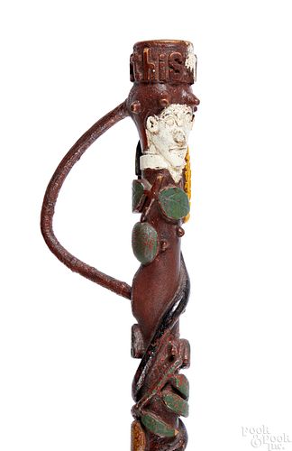 Carved and painted cane