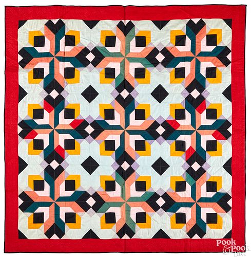 Vibrant geometric pieced quilt