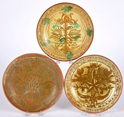 Three Thomas Stahl sgraffito redware plates