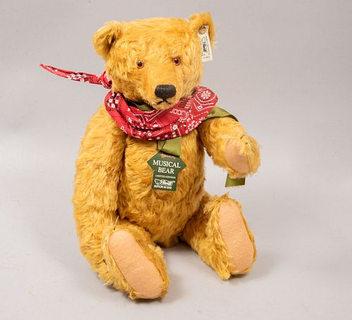 Musical Toy Bear. Germany. 20th century. Steiff. Plush toy. Series number 01644. With button and brand label.