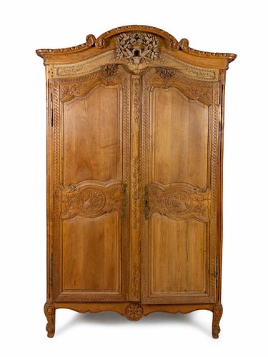 A Louis XV Provincial Style Walnut Armoire