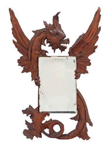 A Renaissance Revival Carved Walnut Mirror