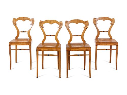A Set of Four Biedermeier Oak Side Chairs