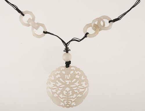 Carved Jade Pendant on a Black Cord Necklace 