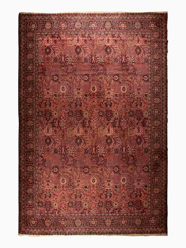 A Machine-Woven Persian Style Wool Rug