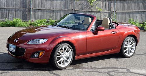 2012 Mazda MX5 Miata convertible, 4 cylinder, red with black interior, only 5,380 miles.
