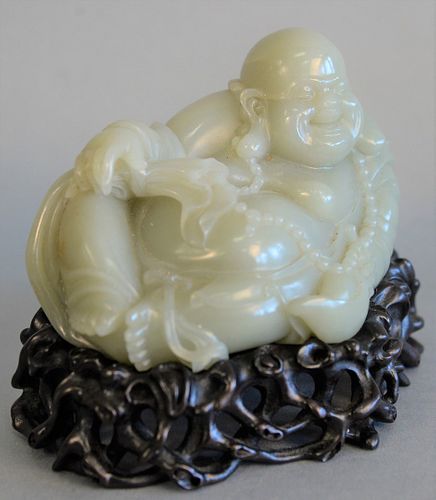 Celadon jade carved figure of a Buddha on carved base, total ht. 4 1/2", total lg. 6".