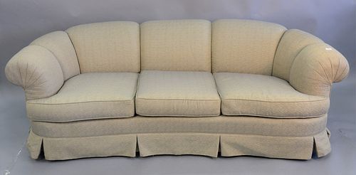 Custom upholstered three-cushion sofa with curved back, 30" h. x 88" w. x 22" d. (seat).