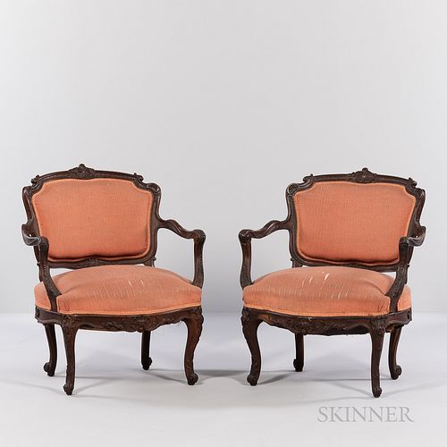 Pair of Louis XV-style Carved Walnut Fauteuils