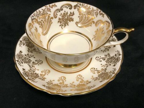 Paragon porcelain White and Gold Cup and saucer made in England