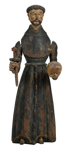 Carved St. Francis Santos Figure Holding a Skull